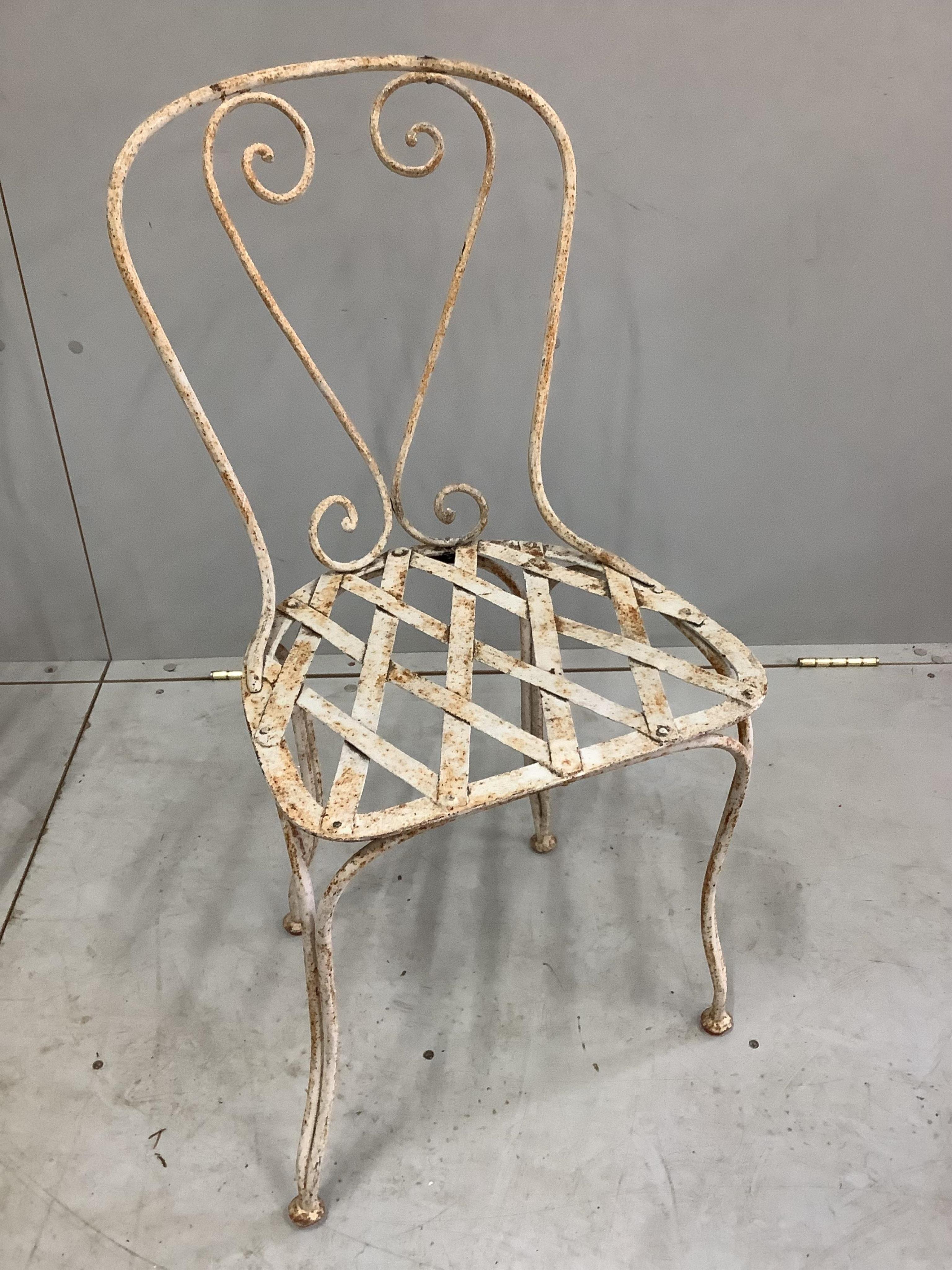 Two pairs of painted wrought iron garden chairs, height 80cm. Condition - oxidised, otherwise fair